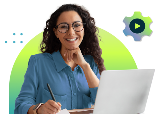 woman with glasses on computer